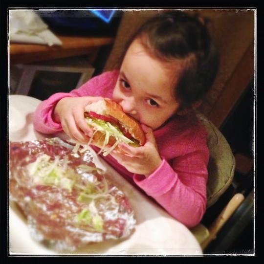 Smartphone Photography - Picture of the girl eating a huge sandwich
