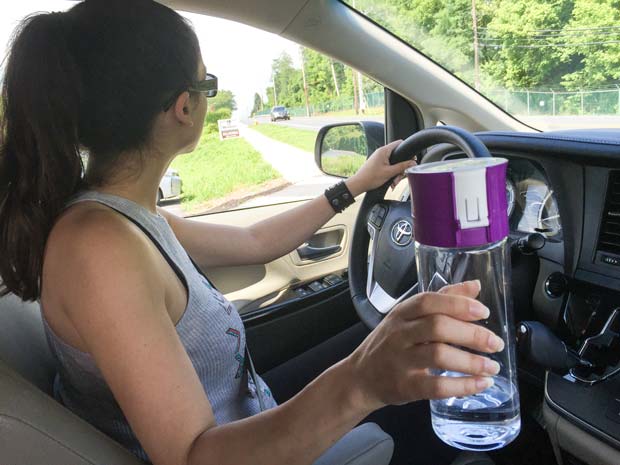 Holding-Water-Bottle