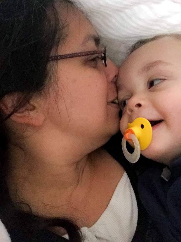 Mommy and baby smile at each other - free stuff for new moms