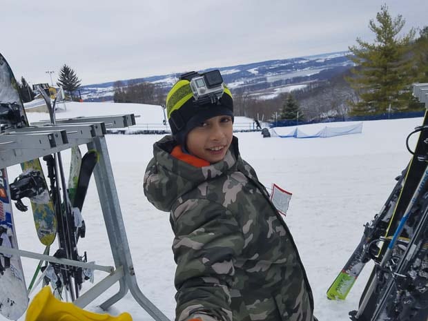 Ski at the Chestnut Mountain Resort boy on hill