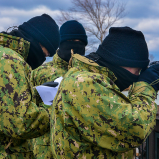 3 sea cadets practicing geo locating things